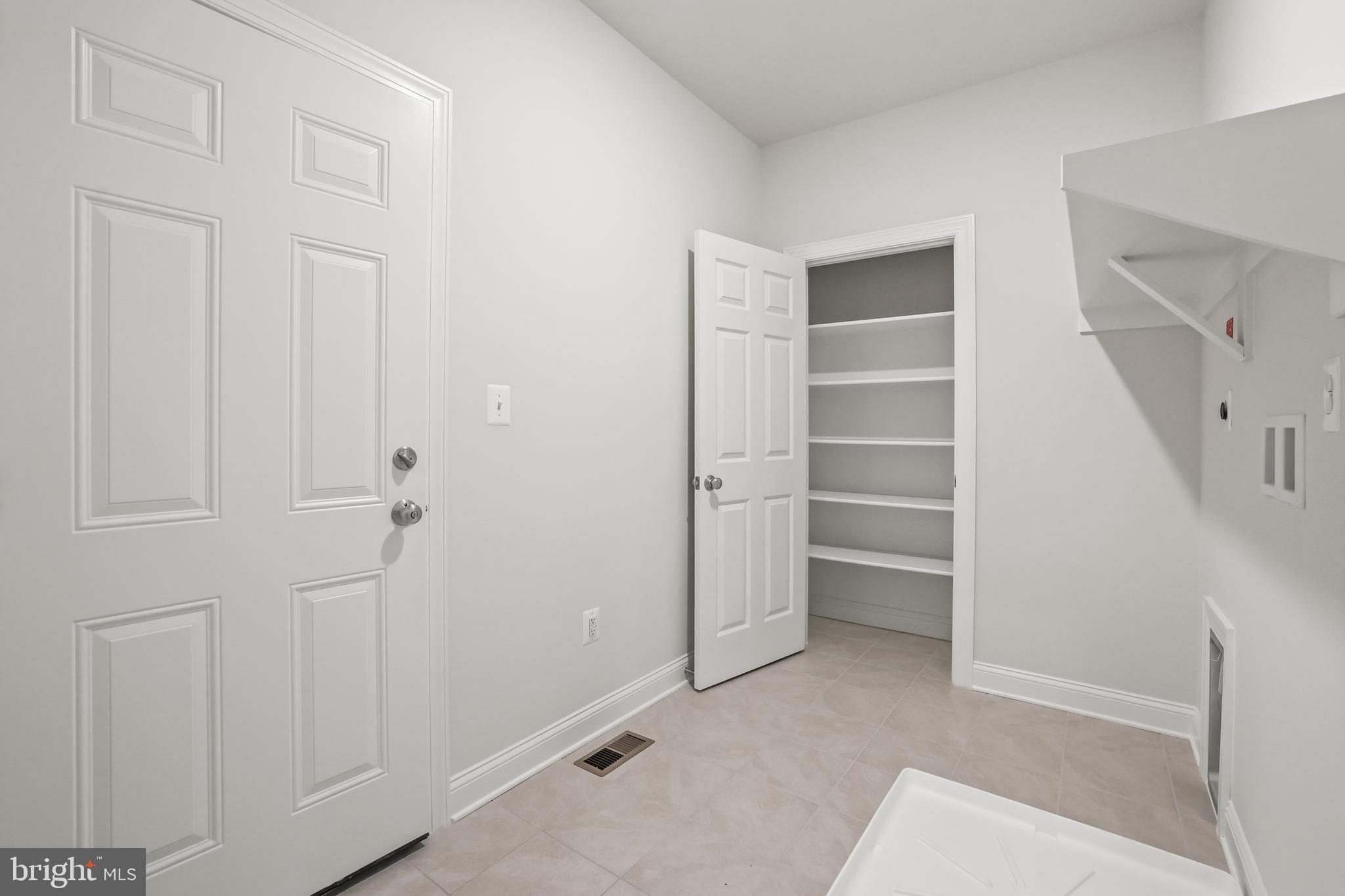 14496 Aurora Drive Woodbridge, VA 22193 - Photo 32 of 70 a view of walk in closet with empty racks