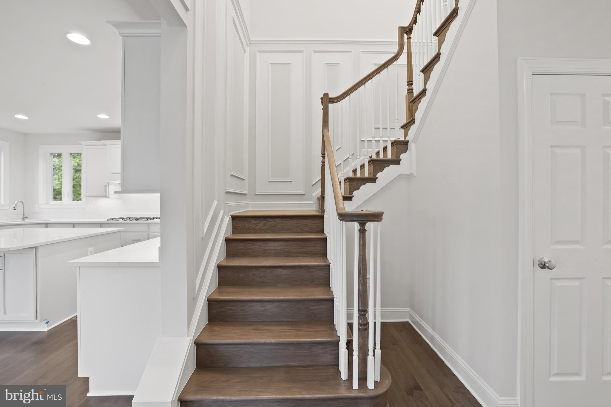 14496 Aurora Drive Woodbridge, VA 22193 - Photo 36 of 70 a view of staircase with white walls and white walls