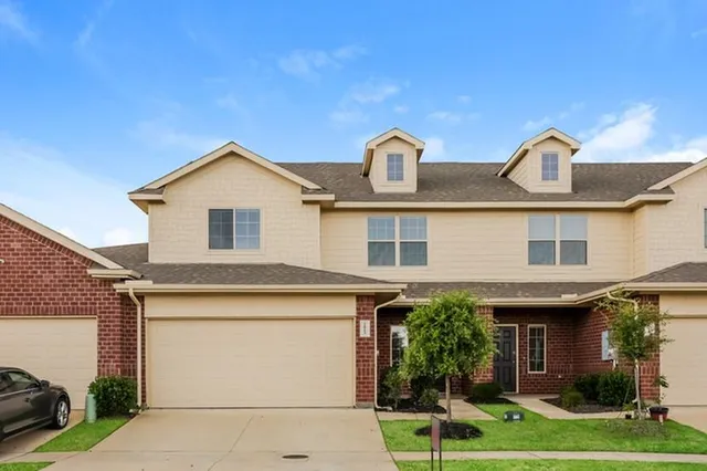 a view of yard with outdoor seating and green space