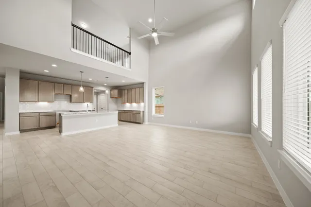 a view of a kitchen with furniture and a window