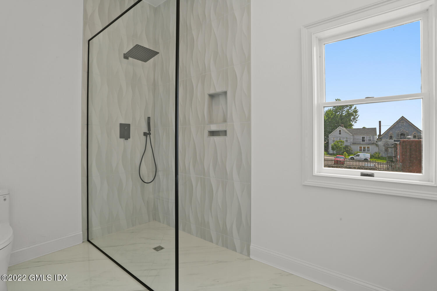 111 Mill Street, Unit PH Greenwich, CT 06830 - Photo 14 of 20 a bathroom with a glass shower door