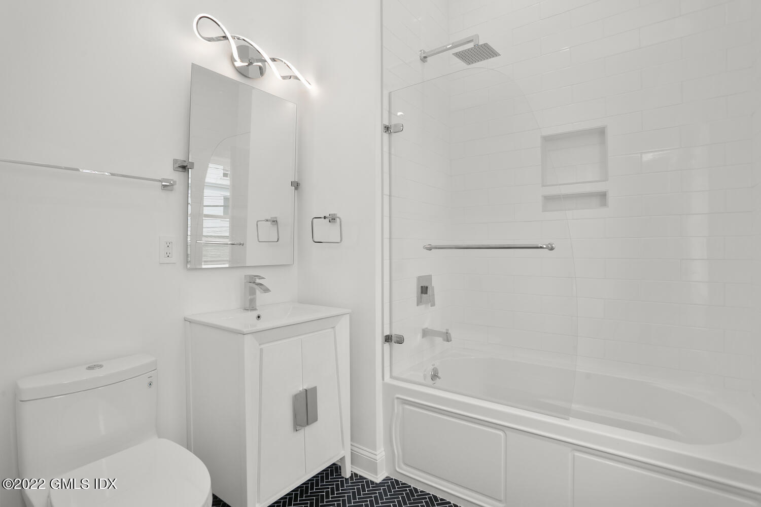 111 Mill Street, Unit PH Greenwich, CT 06830 - Photo 16 of 20 a bathroom with a sink a toilet and shower