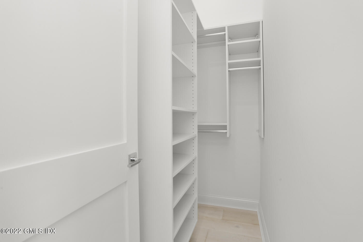 111 Mill Street, Unit PH Greenwich, CT 06830 - Photo 17 of 20 a view of walk in closet with empty racks