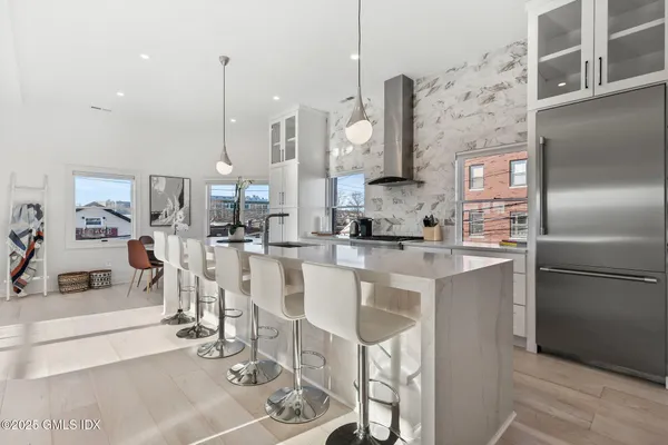 a large kitchen with cabinets