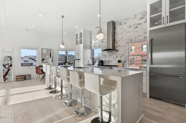 a large kitchen with cabinets