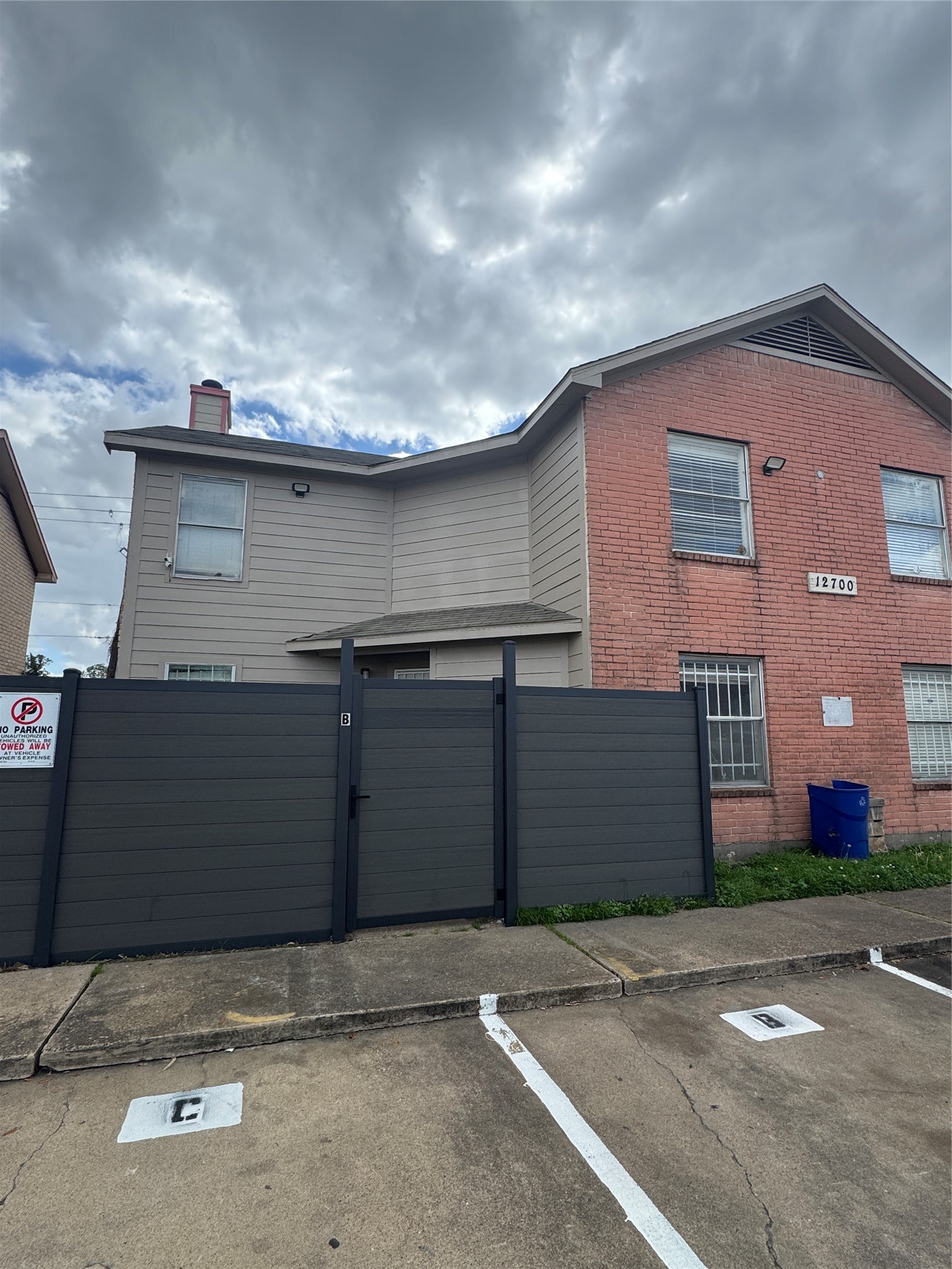 12700 Leader Street, Unit B Houston, TX 77072 - Photo 3 of 7 front view of a house with a street