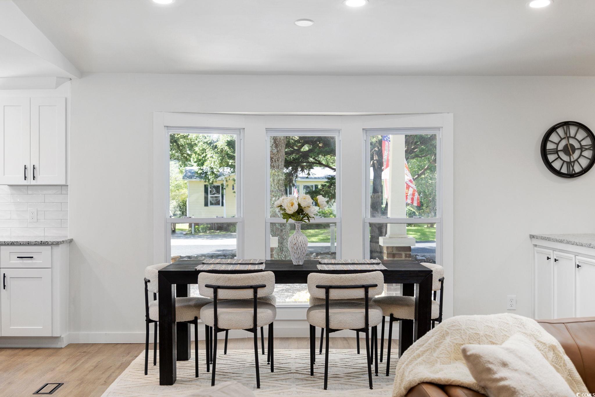 983 South Marlin Circle Murrells Inlet, SC 29576 - Photo 11 of 40 Dining space with recessed lighting and light wood-style floors