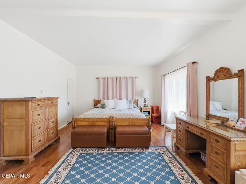 4135 Emory Road El Paso, TX 79922 - Photo 63 of 73 a bedroom with a bed and a dresser