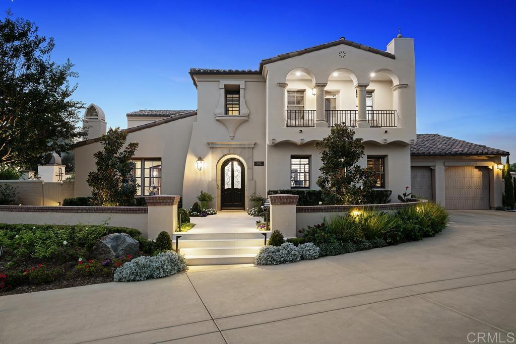 8050 Danny Boy Road San Diego, CA 92127 - Photo 1 of 42 a front view of a house with a yard