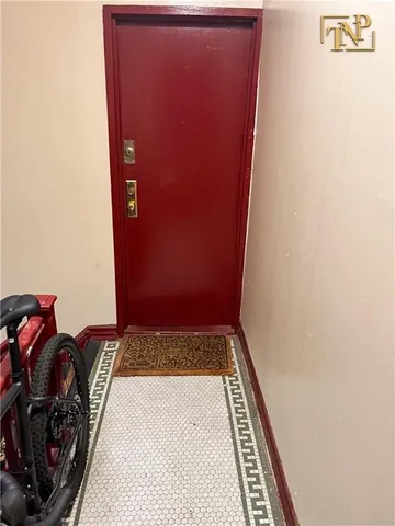 a view of entryway with wooden wall