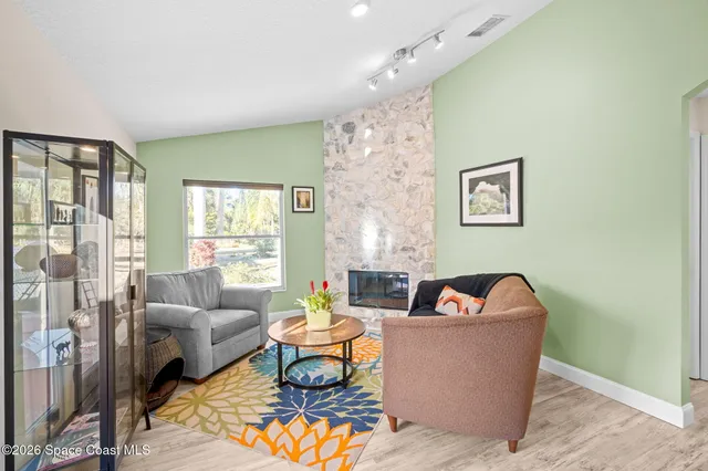 a room with a bed and a window