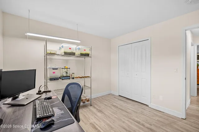 a bed room with a bed and a table