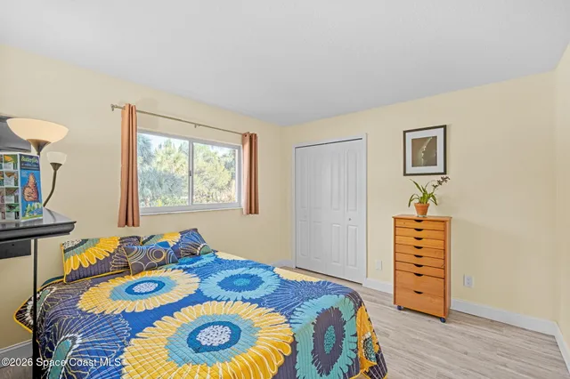 a view of a lake from a balcony