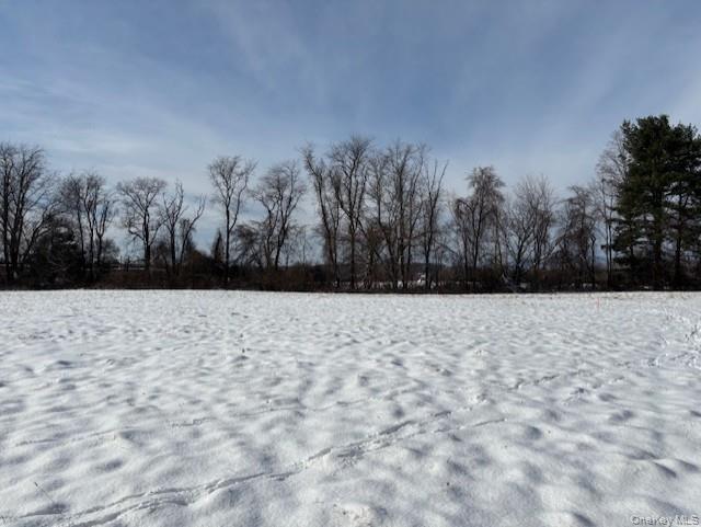a view of entryway covered with snow
