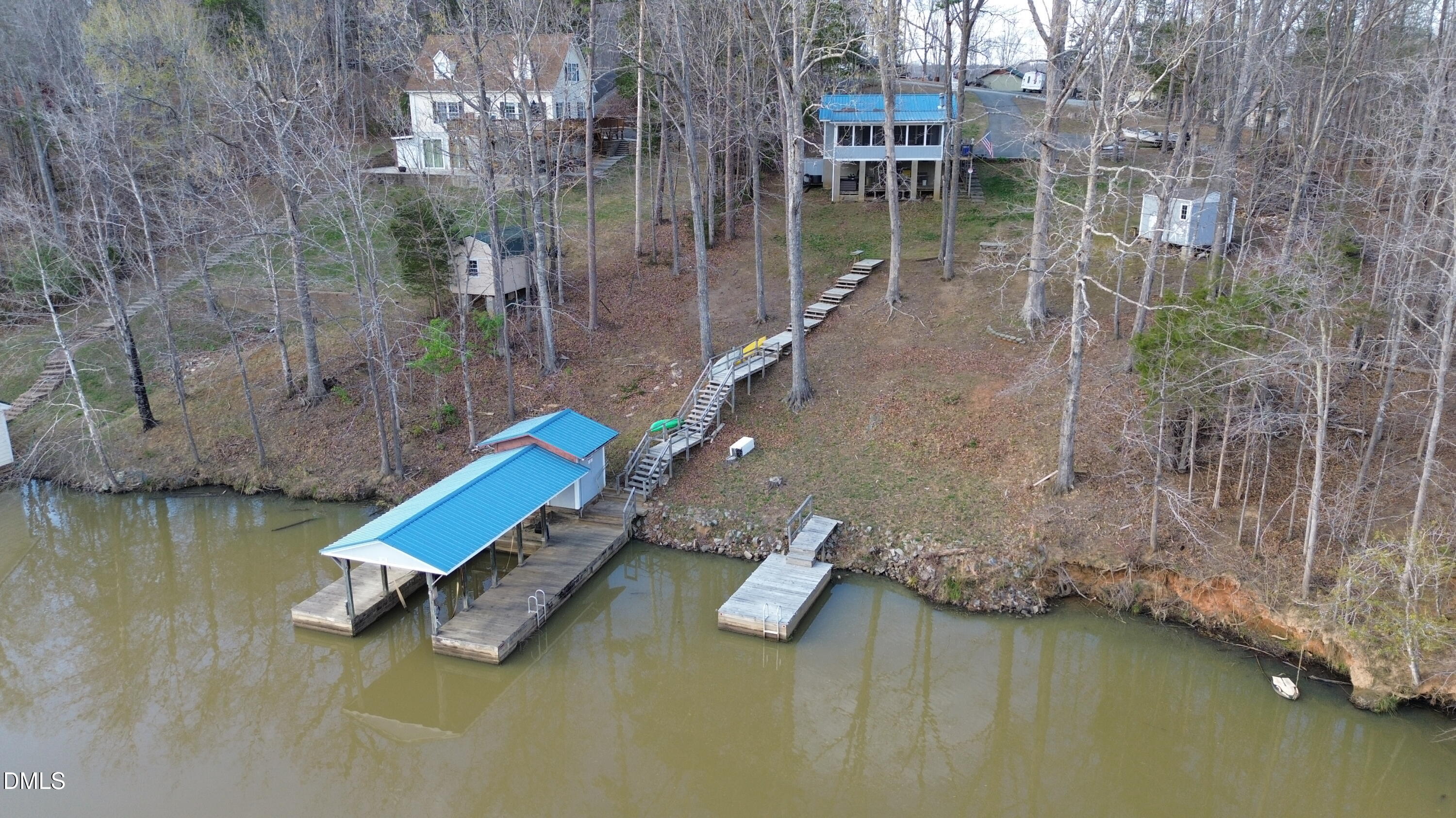 1088 Hyco Hills Road Semora, NC 27343 - Photo 23 of 27 a view of a lake with a mountain
