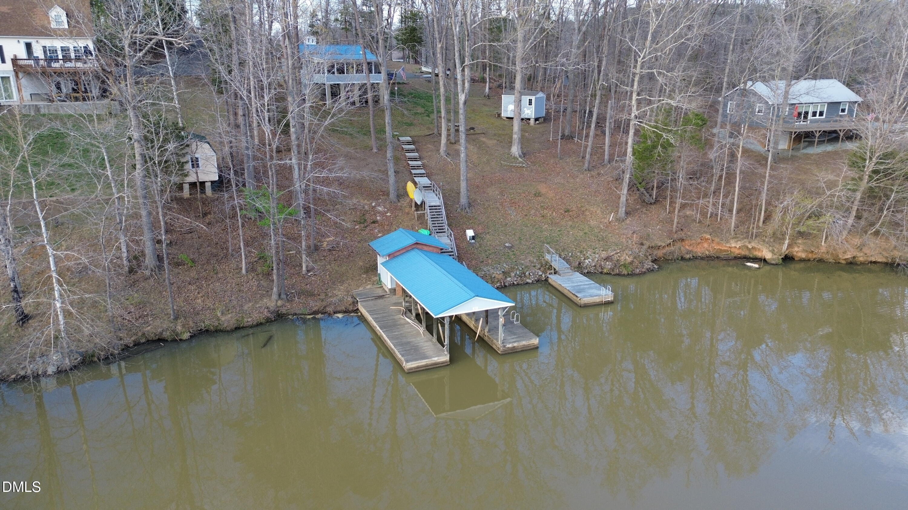 1088 Hyco Hills Road Semora, NC 27343 - Photo 24 of 27 a view of a lake with a mountain in the background
