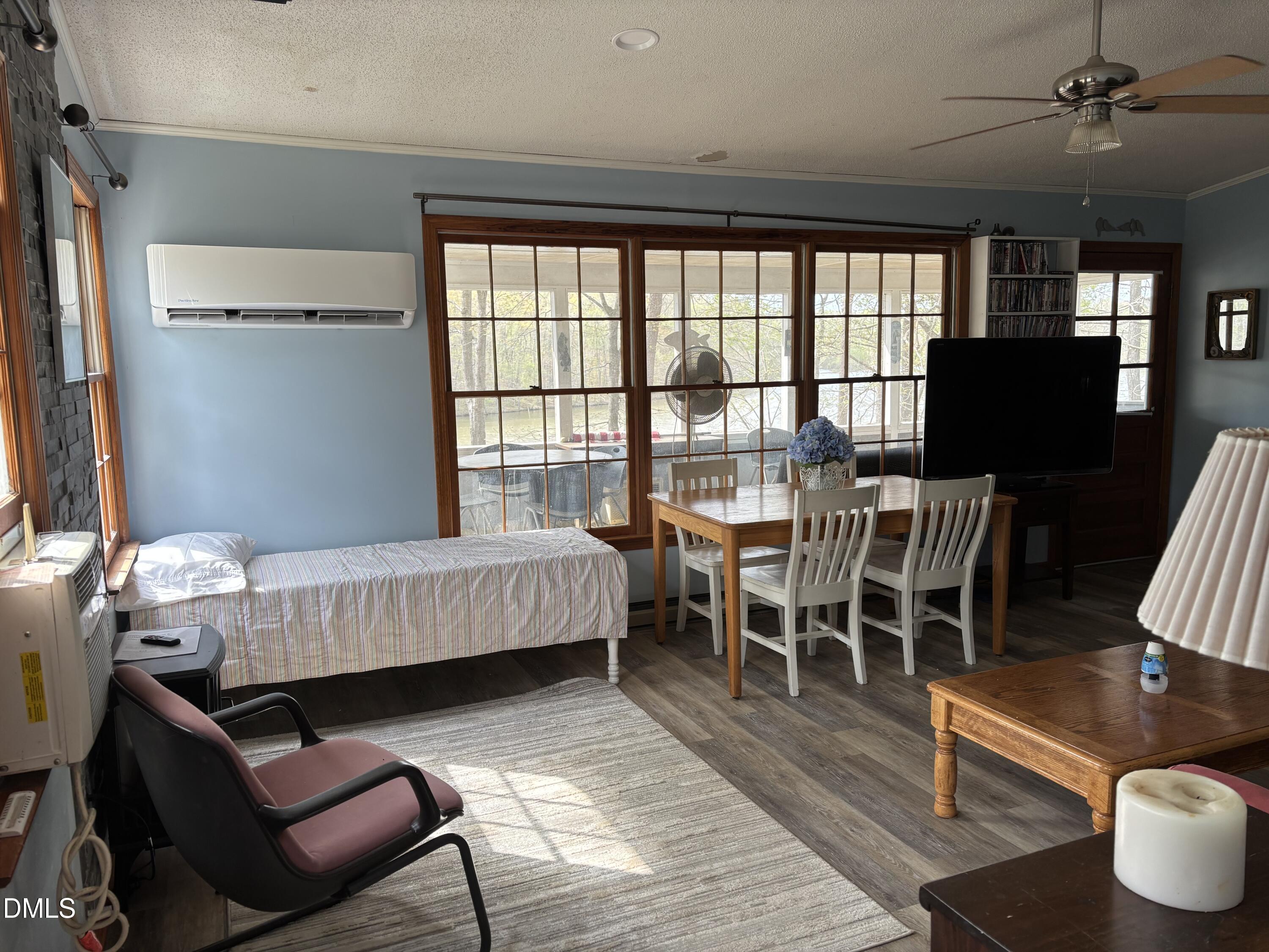 1088 Hyco Hills Road Semora, NC 27343 - Photo 4 of 27 a dining room with furniture and wooden floor