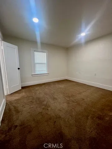 an empty room with a natural light