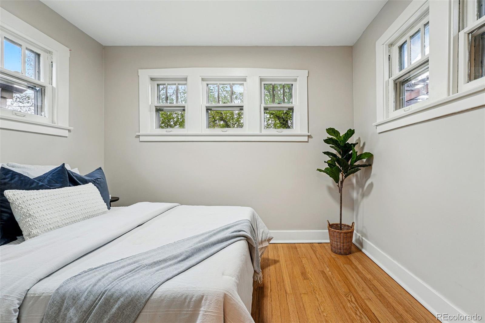 1312 Ash Street Denver, CO 80220 - Photo 24 of 31 a bedroom with a bed and a window