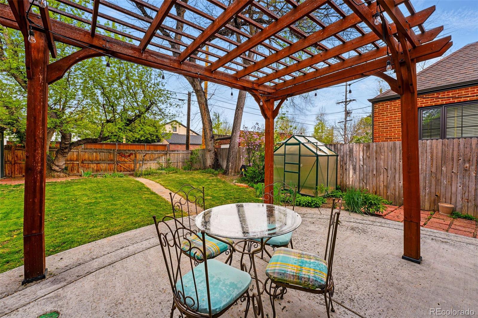 1312 Ash Street Denver, CO 80220 - Photo 29 of 31 a patio with a yard table and chairs