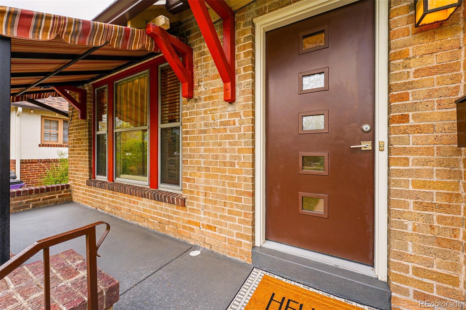 1312 Ash Street Denver, CO 80220 - Photo 5 of 31 a view of front door of house