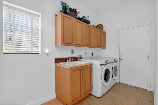 a view of entryway with wooden floor and cabinet