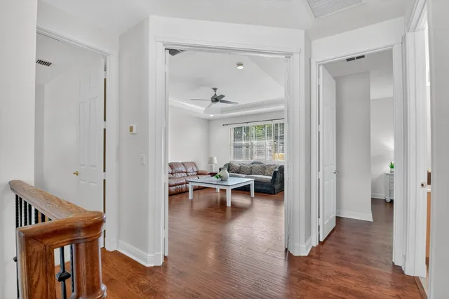 a bedroom with a bed couch and window