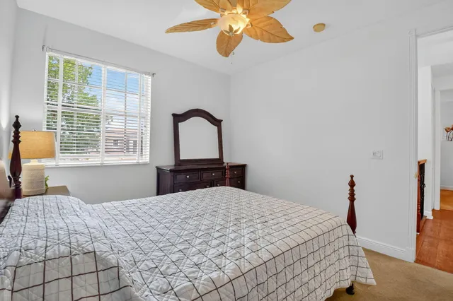 a outdoor space with lots of furniture and a chandelier