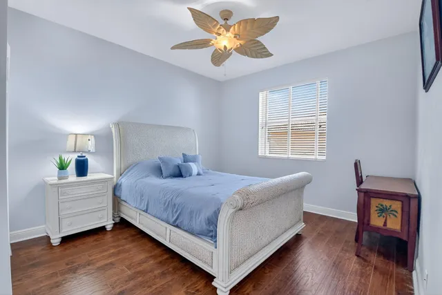 a bedroom with furniture and a window