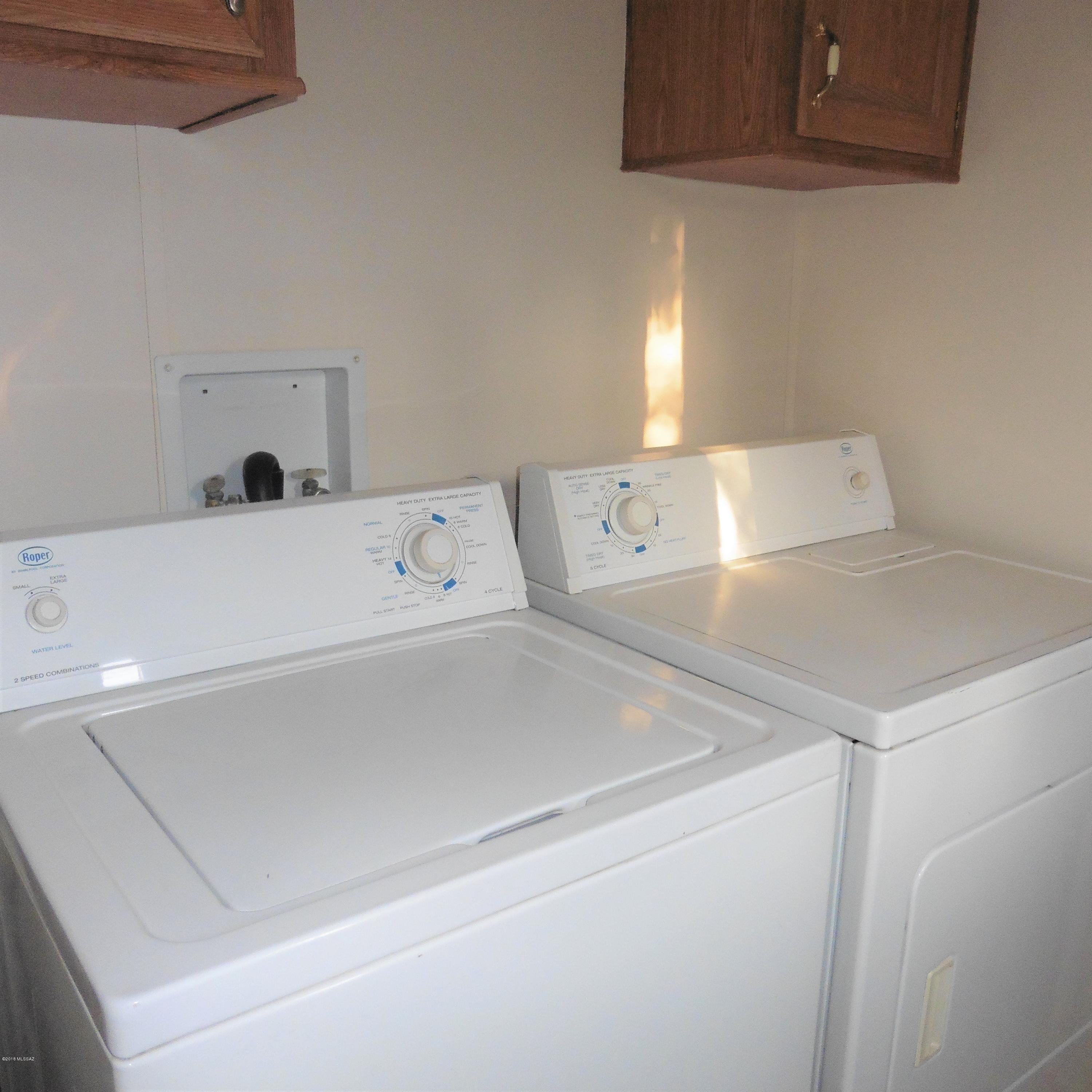 4906 West Massingale Road Tucson, AZ 85741 - Photo 17 of 17 a close view of washer and dryer