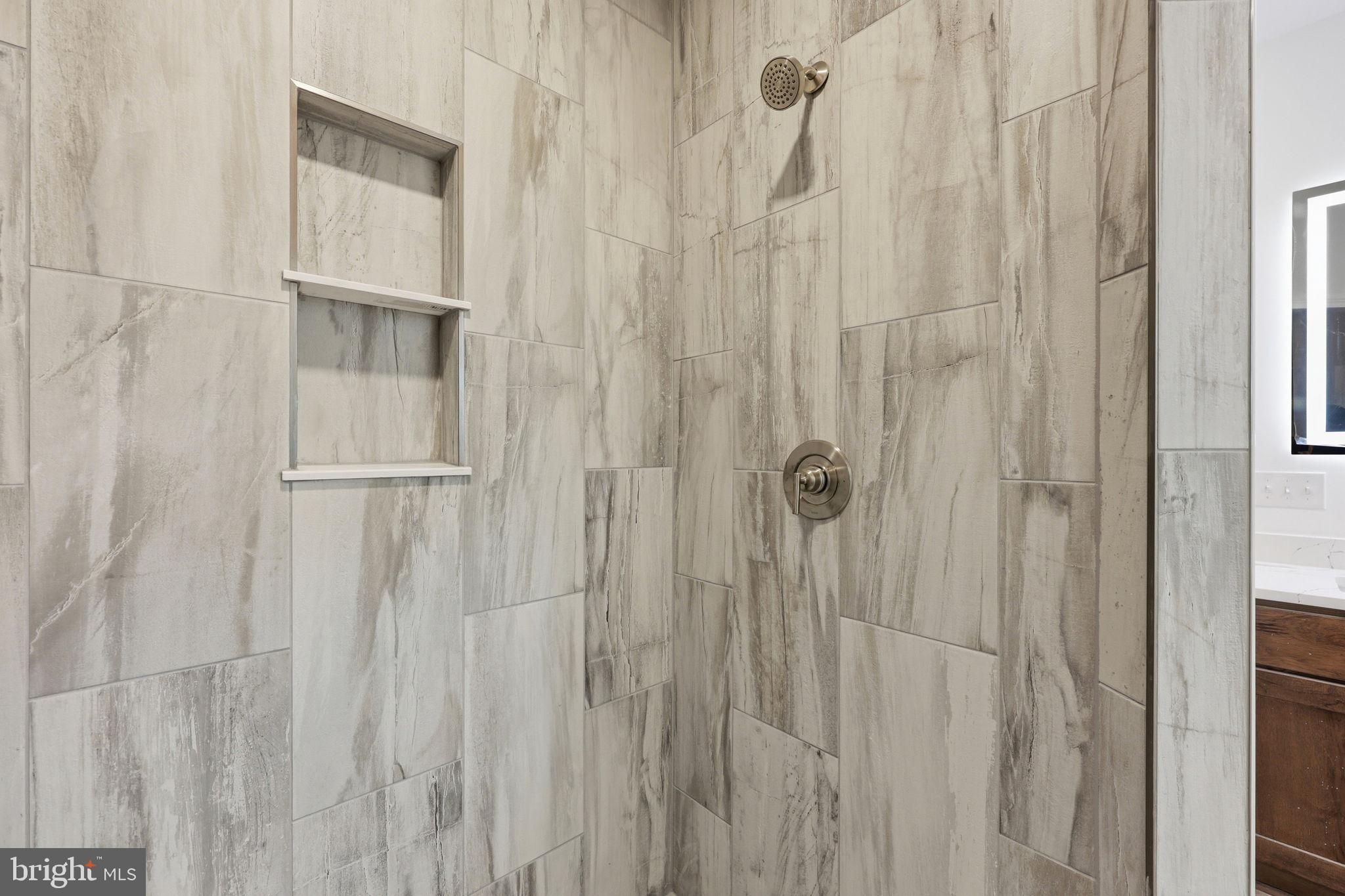 10339 Back Creek Valley Road Hedgesville, WV 25427 - Photo 26 of 48 a bathroom with a shower