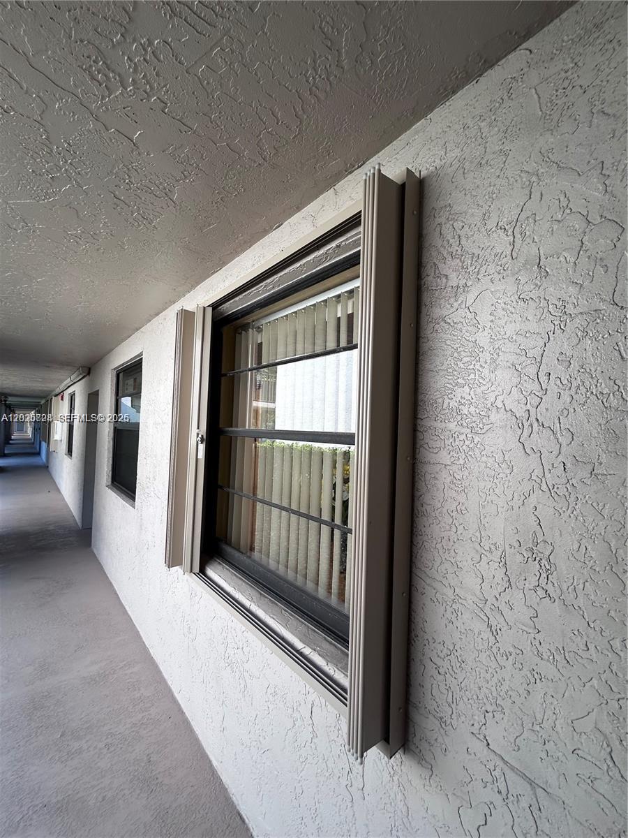 9577 West McNab Road, Unit 110 Tamarac, FL 33321 - Photo 29 of 29 Hurricane Shutters.