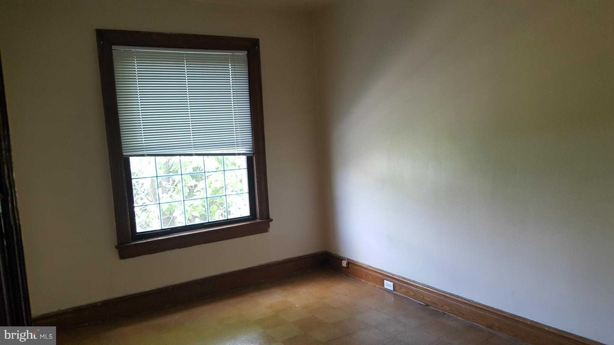 1410 Perry Place Northwest Washington, DC 20010 - Photo 11 of 11 an empty room with windows