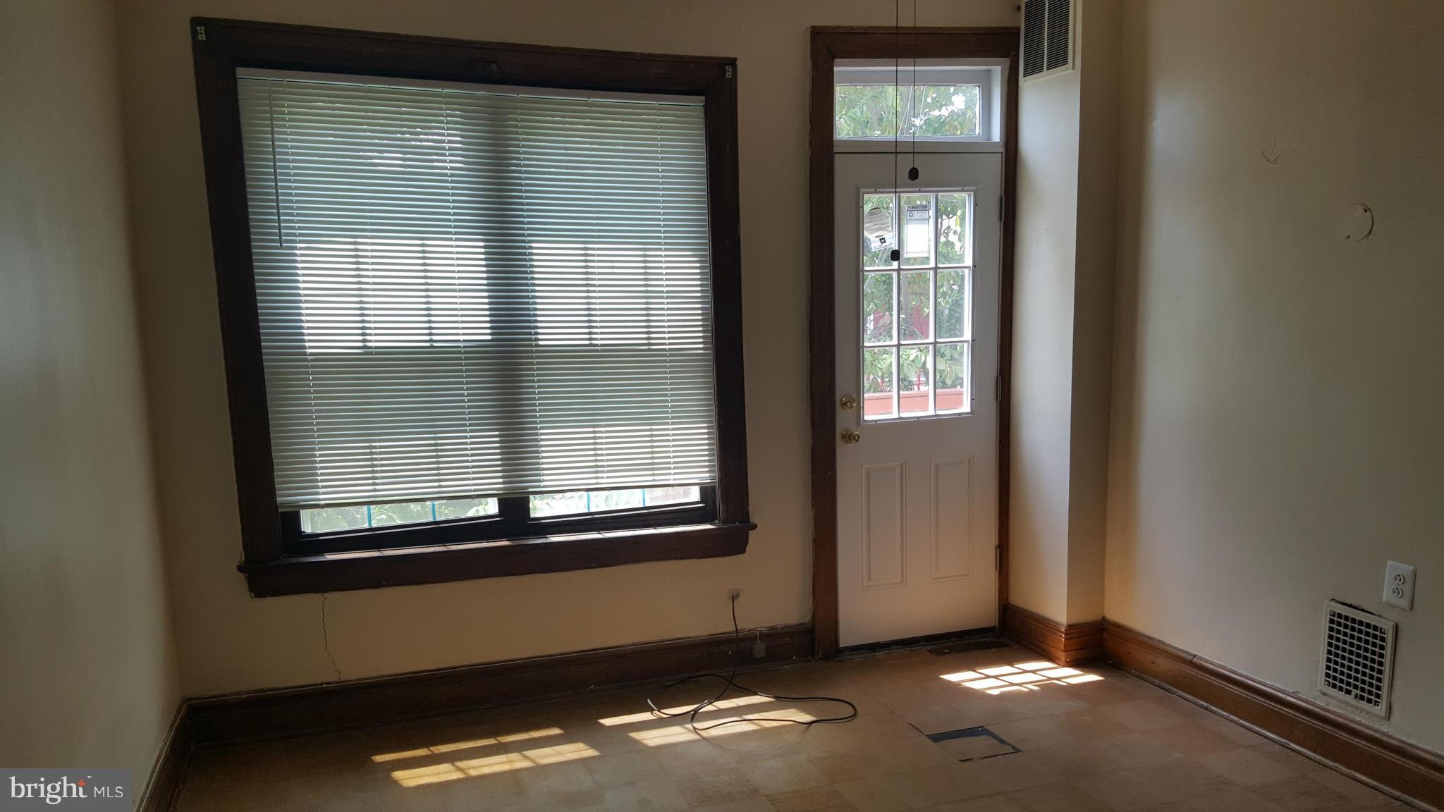 1410 Perry Place Northwest Washington, DC 20010 - Photo 9 of 11 a view of an empty room with a window
