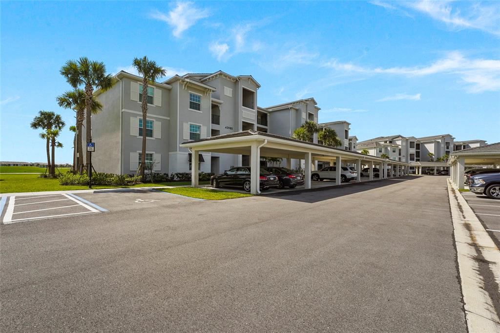 43985 Boardwalk Loop, Unit 2124 Punta Gorda, FL 33982 - Photo 12 of 80 a view of a street with houses