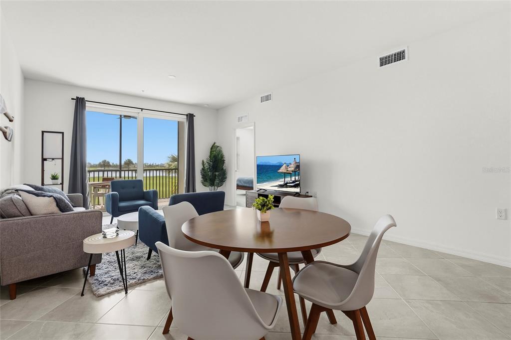 43985 Boardwalk Loop, Unit 2124 Punta Gorda, FL 33982 - Photo 18 of 80 a view of a dining room with furniture