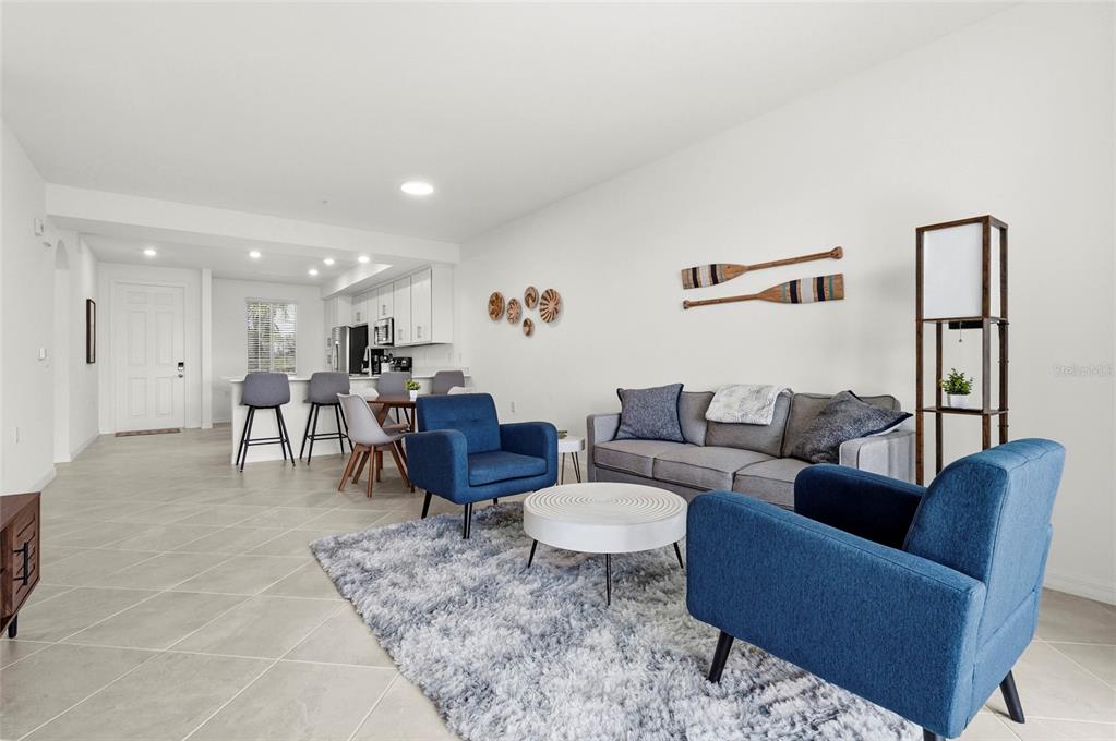 43985 Boardwalk Loop, Unit 2124 Punta Gorda, FL 33982 - Photo 20 of 80 a living room with furniture a rug and a table