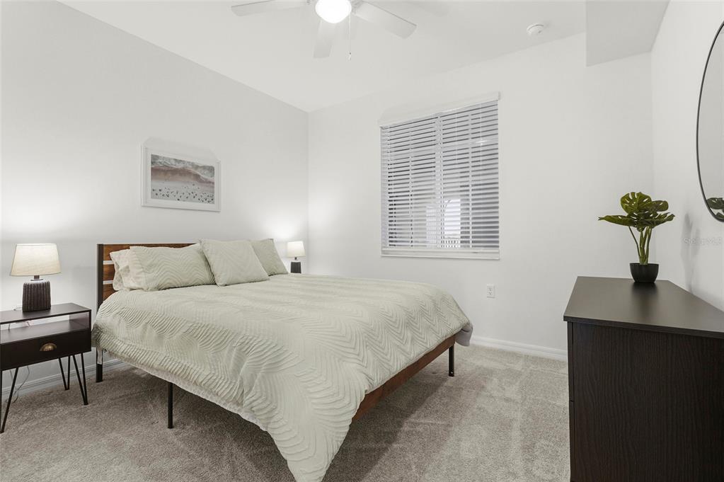 43985 Boardwalk Loop, Unit 2124 Punta Gorda, FL 33982 - Photo 26 of 80 a bedroom with bed and a window