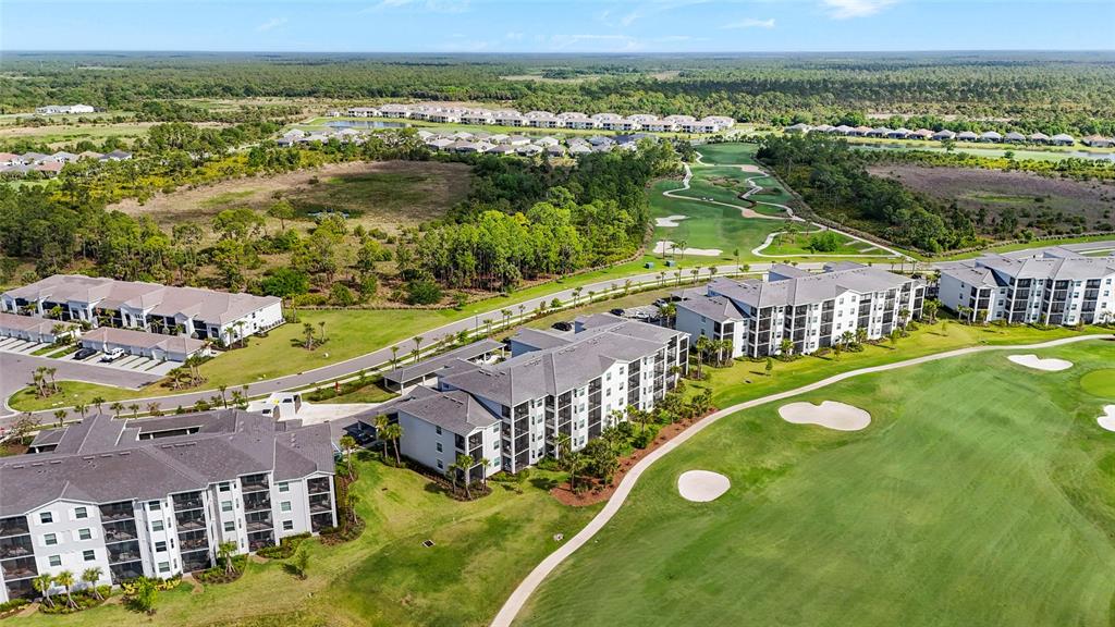 43985 Boardwalk Loop, Unit 2124 Punta Gorda, FL 33982 - Photo 43 of 80 an aerial view of residential houses with outdoor space and river