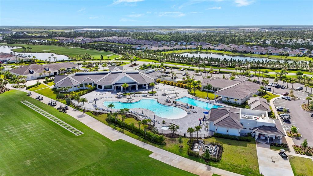 43985 Boardwalk Loop, Unit 2124 Punta Gorda, FL 33982 - Photo 51 of 80 an aerial view of residential houses with outdoor space