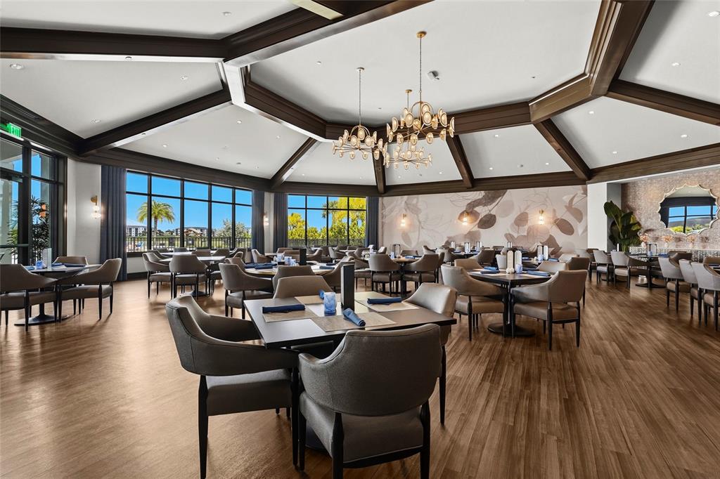43985 Boardwalk Loop, Unit 2124 Punta Gorda, FL 33982 - Photo 72 of 80 a view of a dining room with furniture window and wooden floor