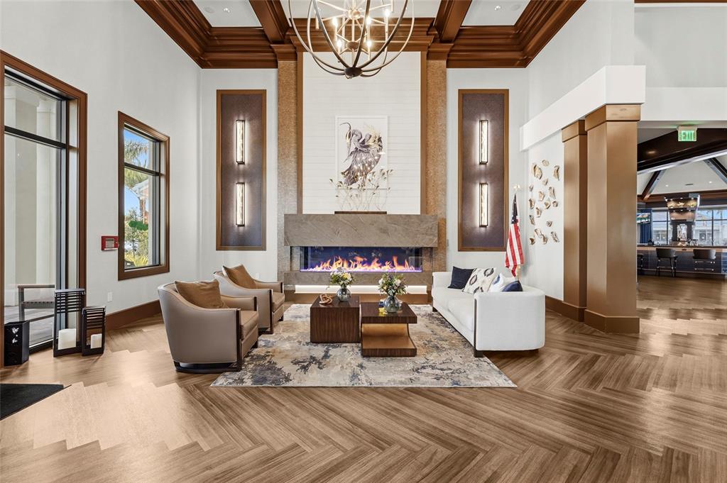 43985 Boardwalk Loop, Unit 2124 Punta Gorda, FL 33982 - Photo 75 of 80 a living room with furniture window and wooden floor