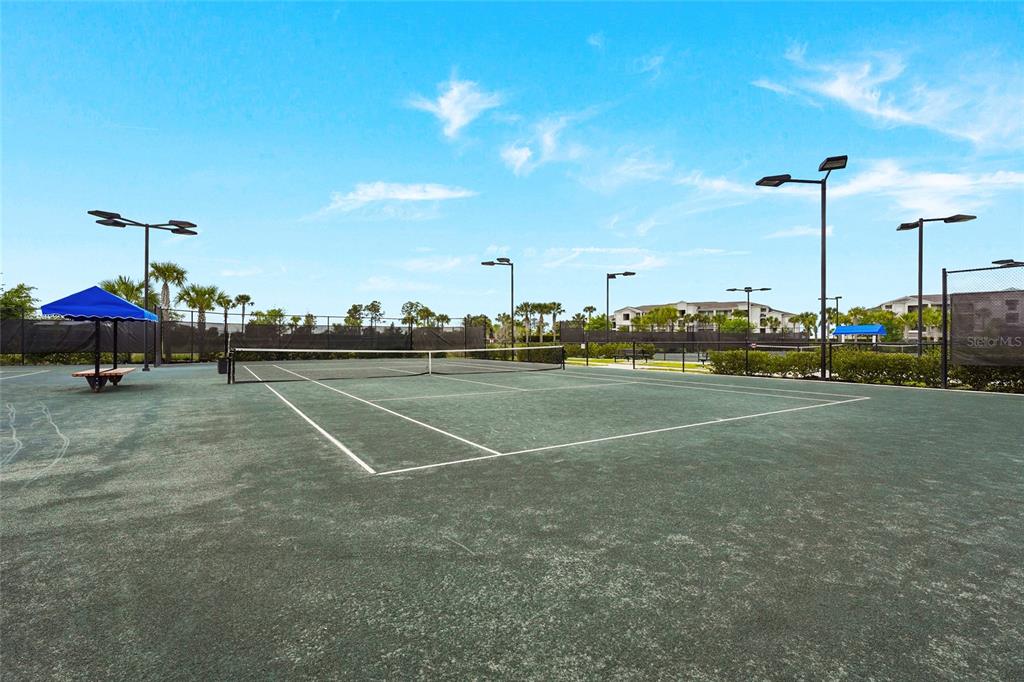 43985 Boardwalk Loop, Unit 2124 Punta Gorda, FL 33982 - Photo 79 of 80 a view of a tennis court