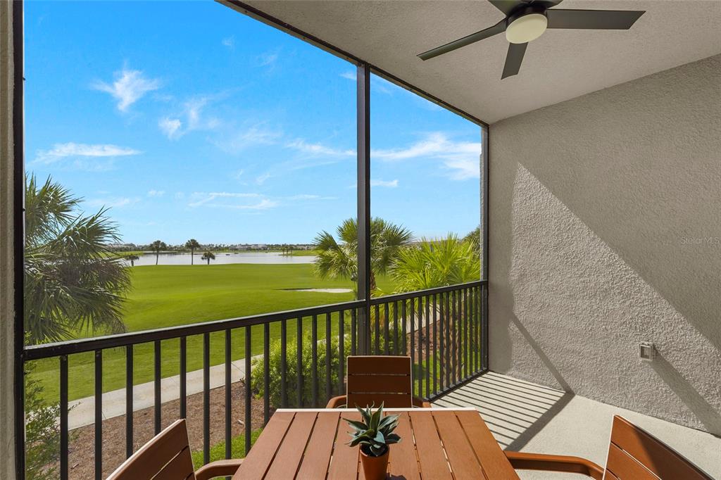 43985 Boardwalk Loop, Unit 2124 Punta Gorda, FL 33982 - Photo 9 of 80 a view of a balcony with wooden floor