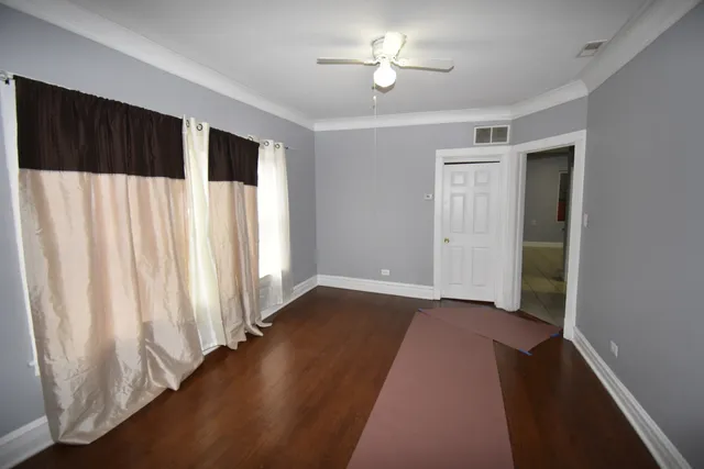 a view of a livingroom with wooden floor