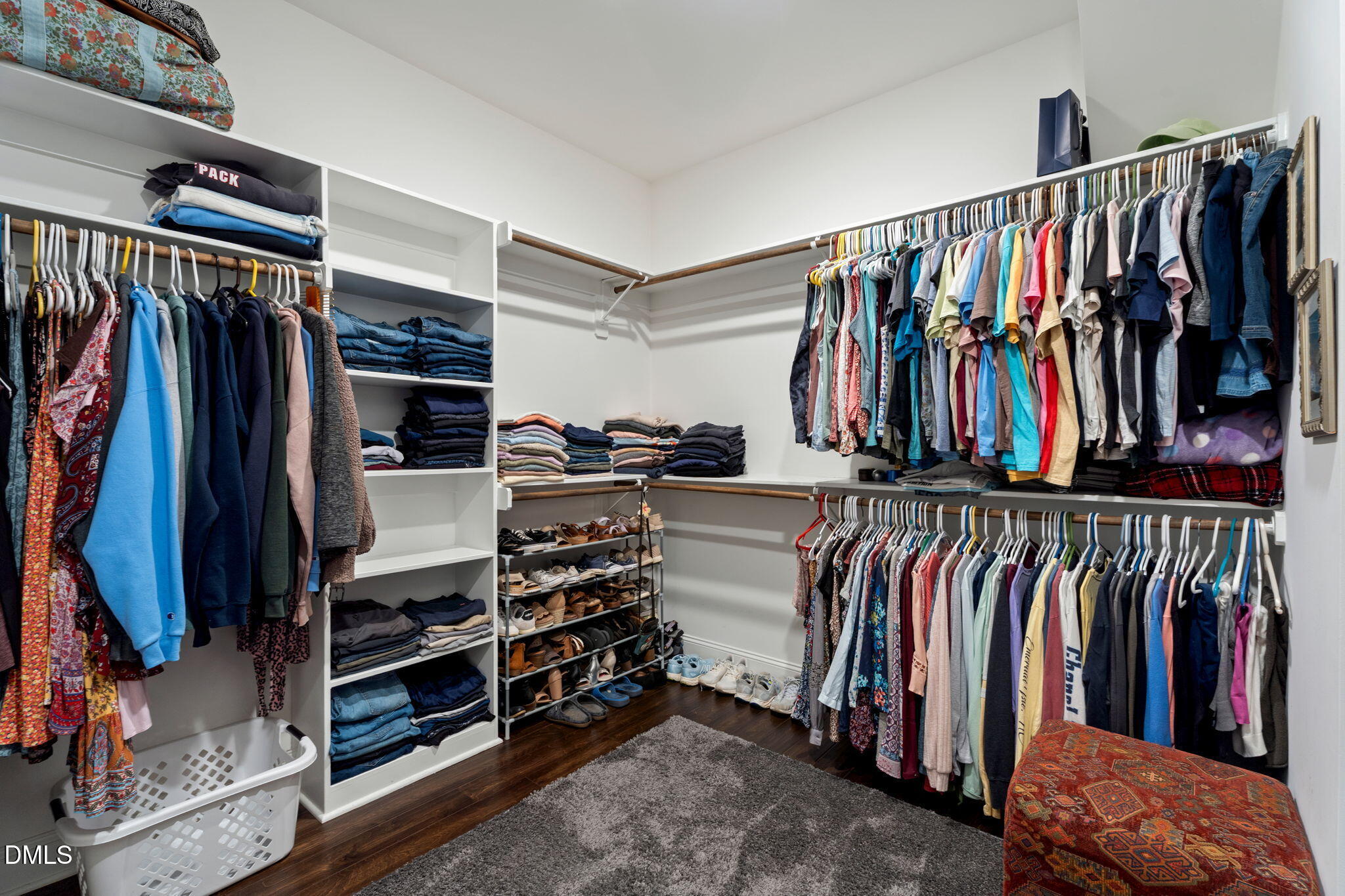 223 Colonial Ridge Drive Pittsboro, NC 27312 - Photo 22 of 47 a view of walk in closet with clothes and shoes