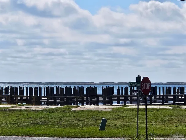 a view of an house with a big yard