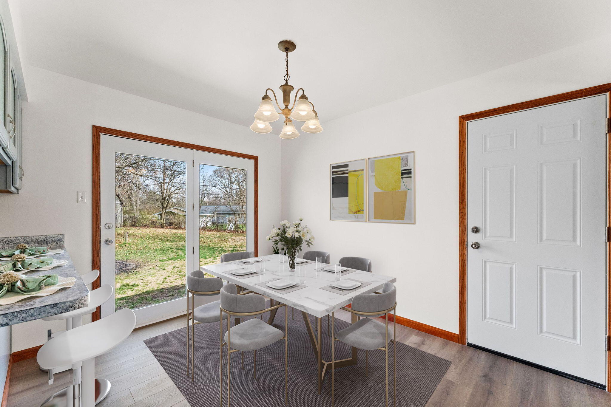 10473 North 493 East Demotte, IN 46310 - Photo 11 of 35 a view of a dining room with furniture window and wooden floor