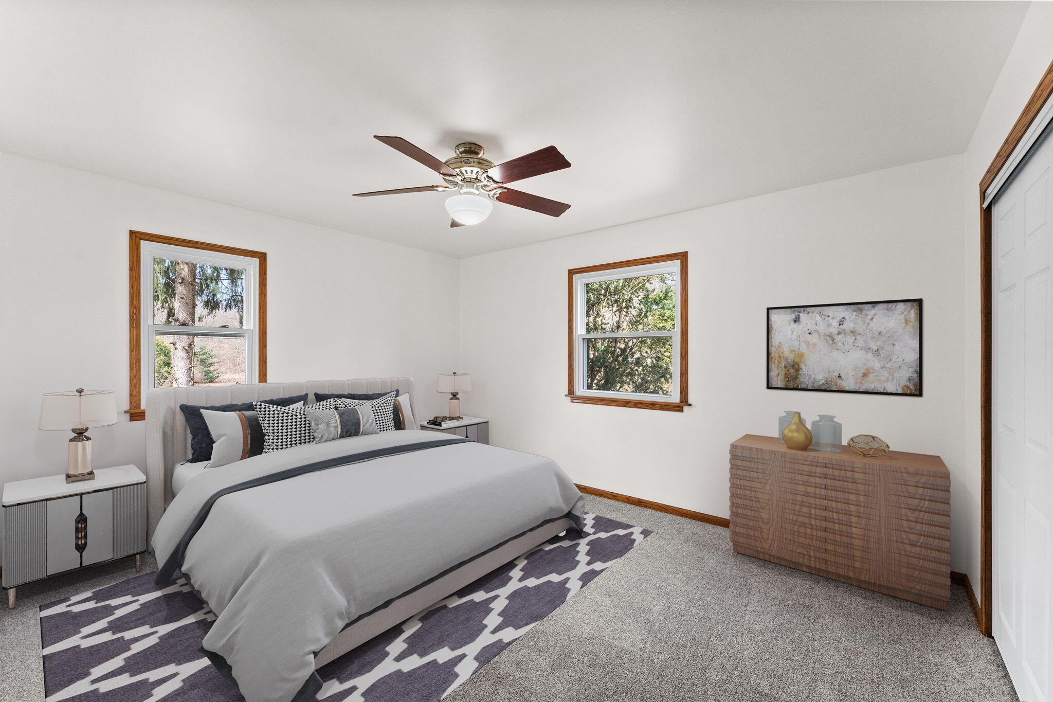 10473 North 493 East Demotte, IN 46310 - Photo 17 of 35 a bedroom with a bed and a chandelier