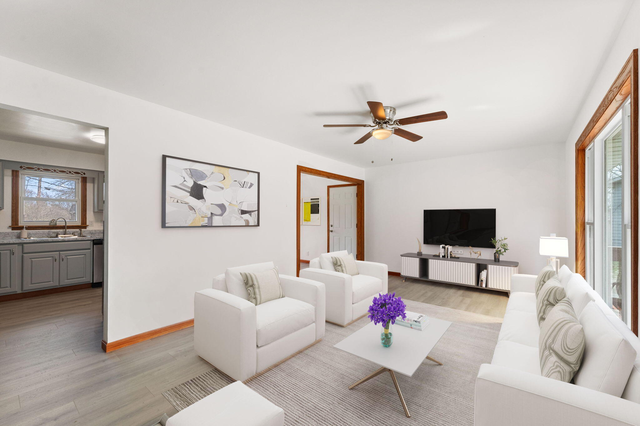 10473 North 493 East Demotte, IN 46310 - Photo 4 of 35 a living room with furniture kitchen view and a flat screen tv